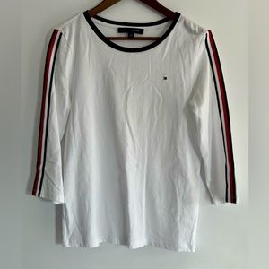 3/4 sleeve white shirt with blue along collar & red/blue stripes along sleeve